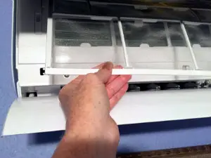 Gently push up and out to remove the air filters for cleaning.