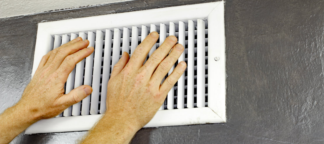 hands over an air vent