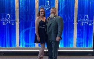 Summer and Rob Terry receiving the President's Award from Carrier