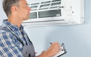 HVAC technician with an HVAC inspection checklist