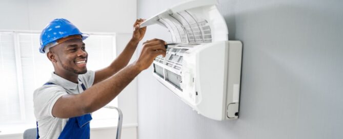 HVAC technician servicing-a-mini-split-heat-pump-system